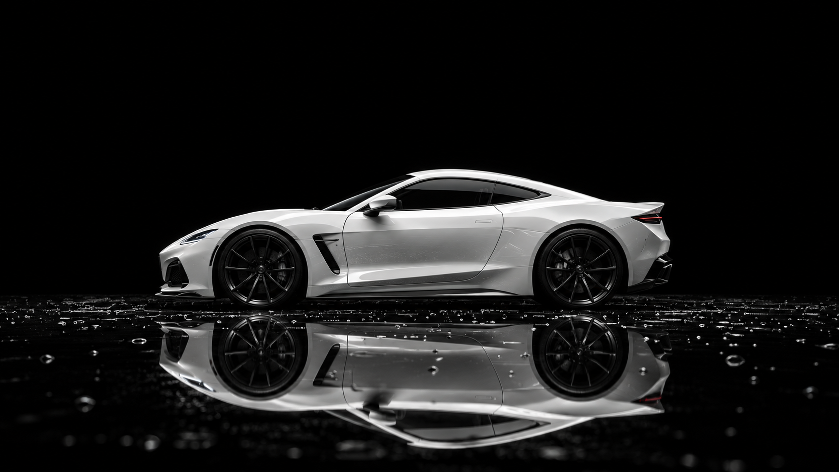 White performance coupe on a reflective wet black studio floor